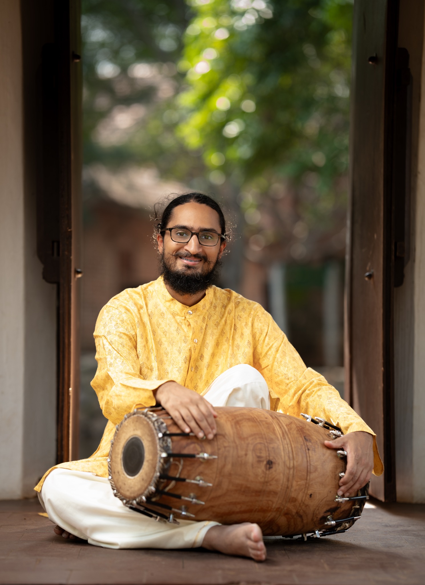 Dr. Rohan Krishnamurthy with a mridangam